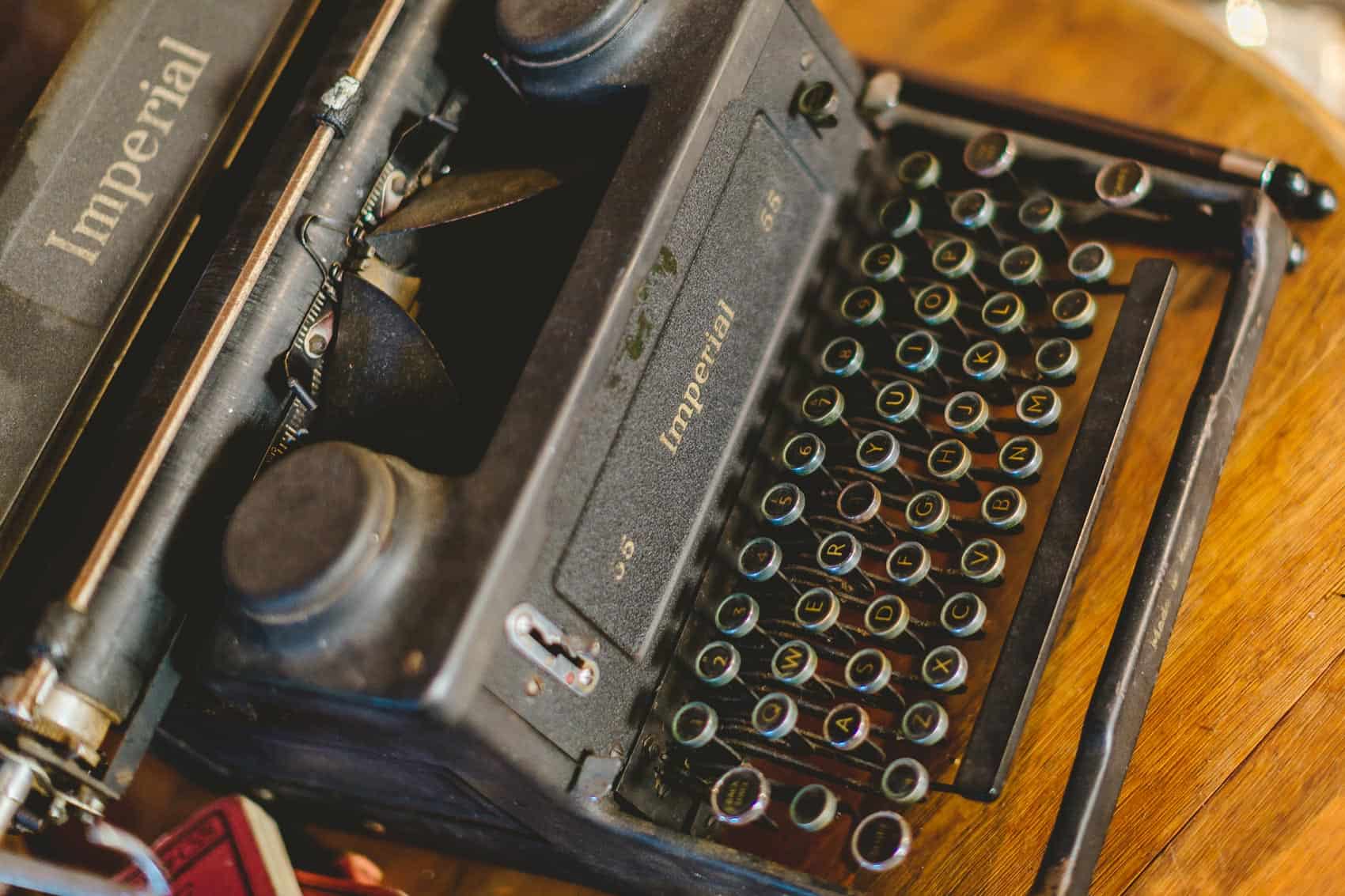 Old imperial typewriter on wooden desk